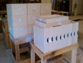 Dovetail drawer boxes labeled per product
