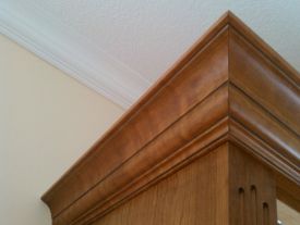 AWI Premium construction - Cabinet crown outside miters created prior to finish